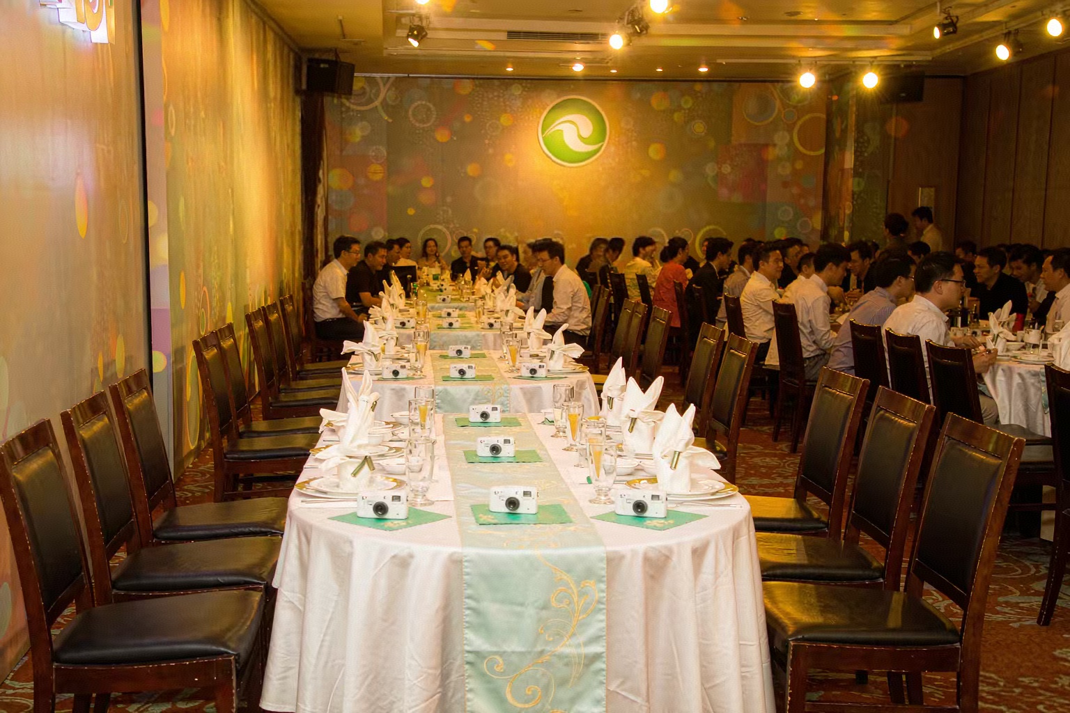 Disposable cameras at a first birthday party table