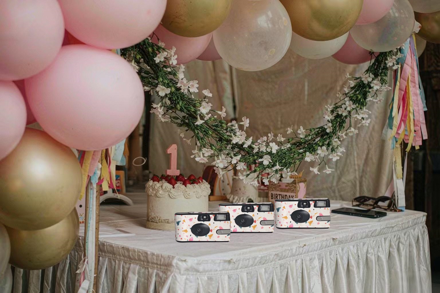Disposable cameras placed on tables at a corporate banquet